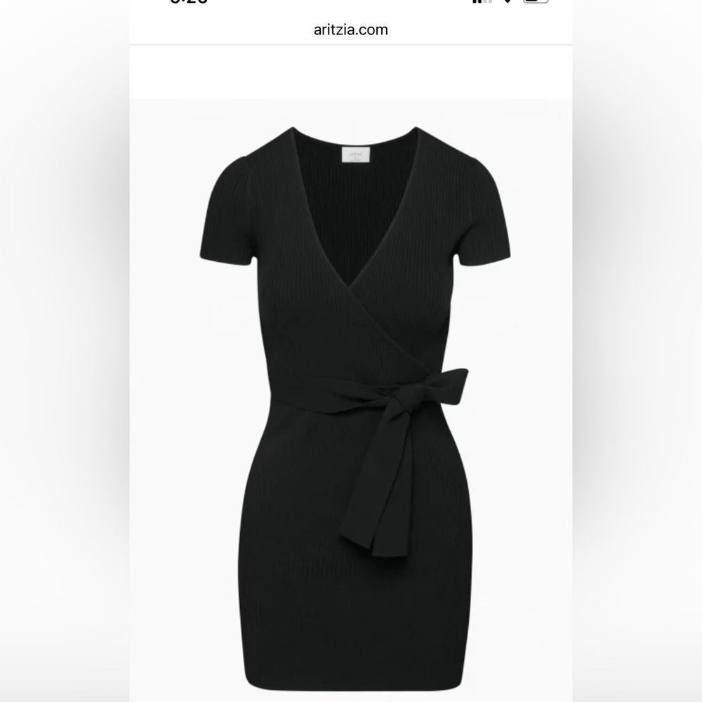 Black knit dress. Never worn, still with tags.